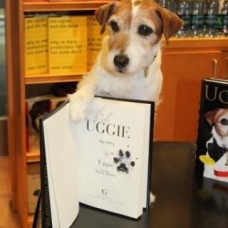 Uggie "signed" his book, "Uggie, My Story" as he visited bookstores around the world - I treasure my pawtographed copy